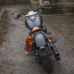 Harley Davidson Softail Slim motorcycle with our universal Nomad pannier and Lone rider seat kit in tan leather